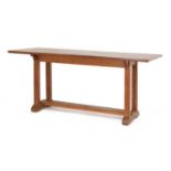 An oak dining table,