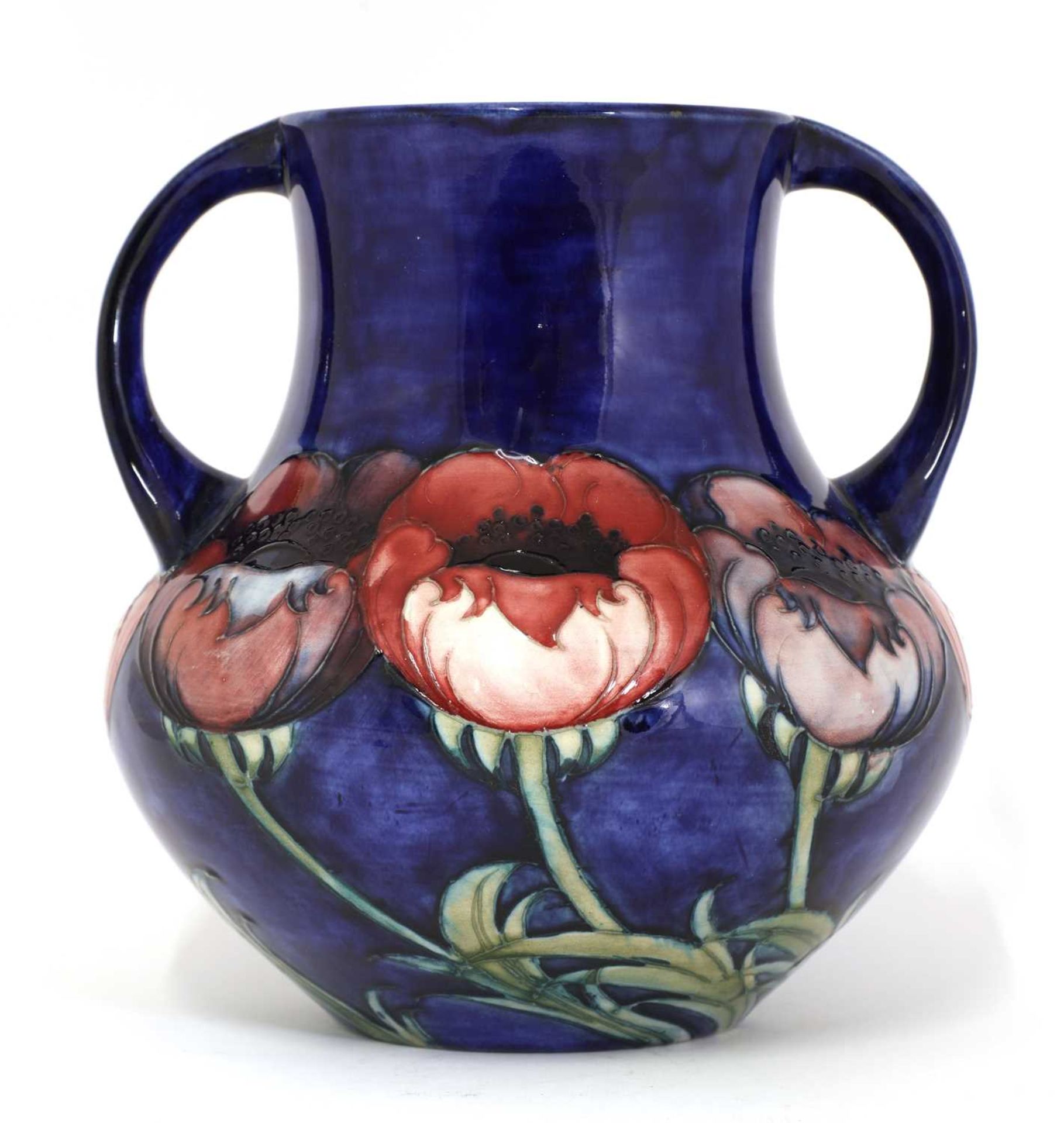 A William Moorcroft ‘Poppy’ pattern pottery vase,