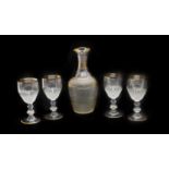 A gilt glass liqueur set,