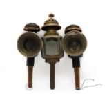 A pair of copper mounted coach lamps