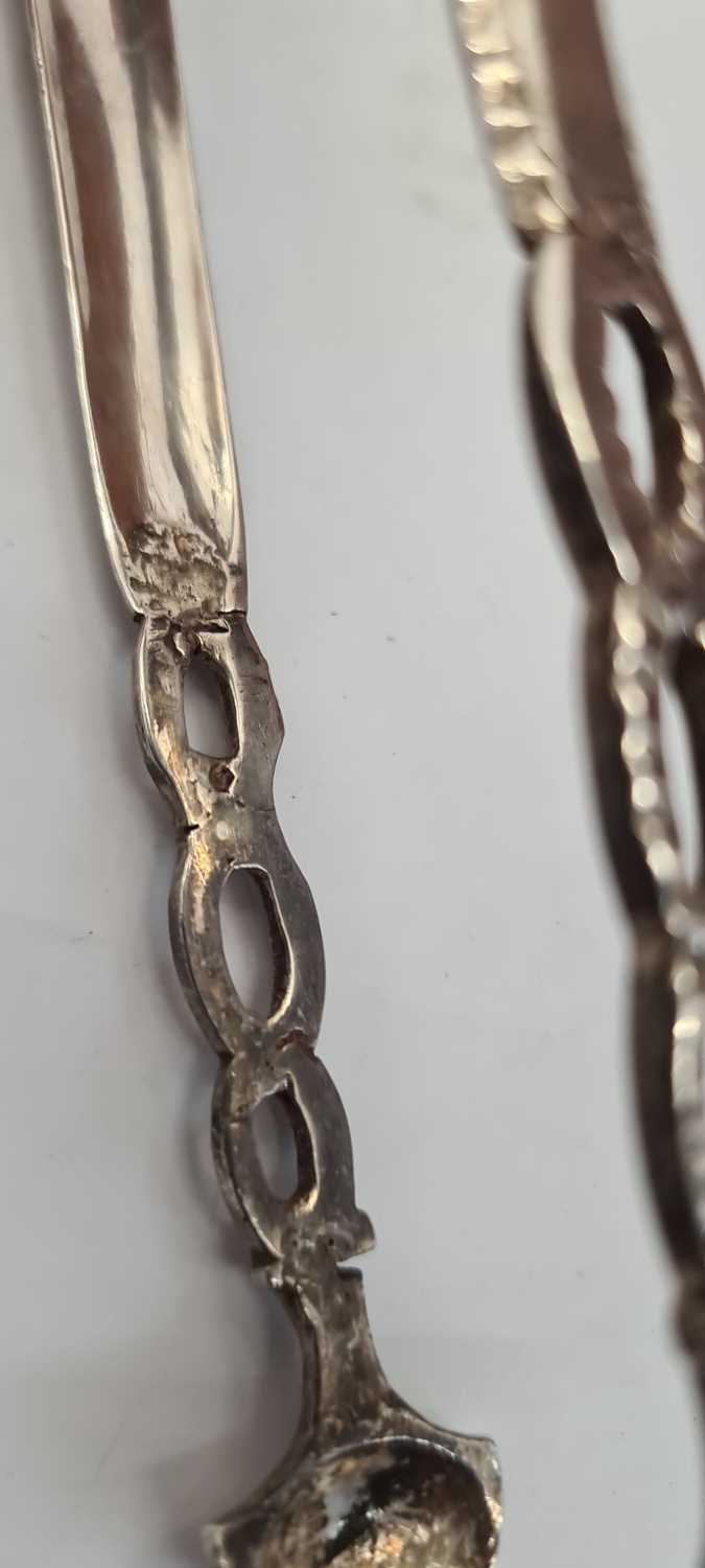 A pair of George III Irish silver sugar tongs, - Image 14 of 21