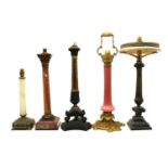 A group of five column table lamps