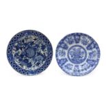 A collection of blue and white china plates,