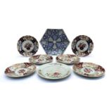 A collection of Oriental porcelain plates and dishes,