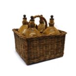 A four-piece stoneware liqueur set,