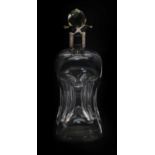 A glass Scrooge decanter