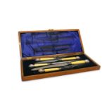 A late Victorian silver mounted carving set,
