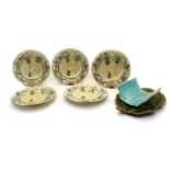 A group of five majolica asparagus plates,