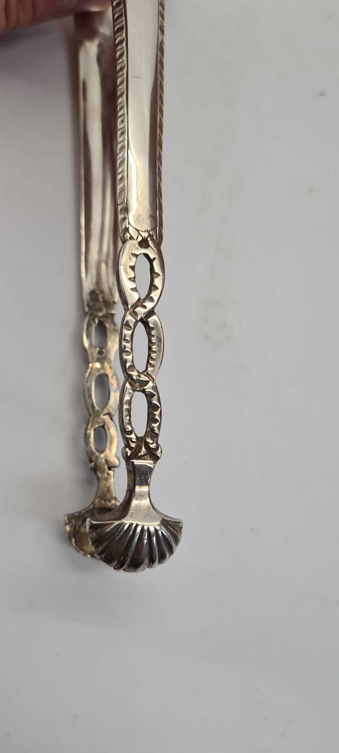 A pair of George III Irish silver sugar tongs, - Image 13 of 21