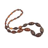 A single row graduated olive shaped buffalo horn bead necklace,