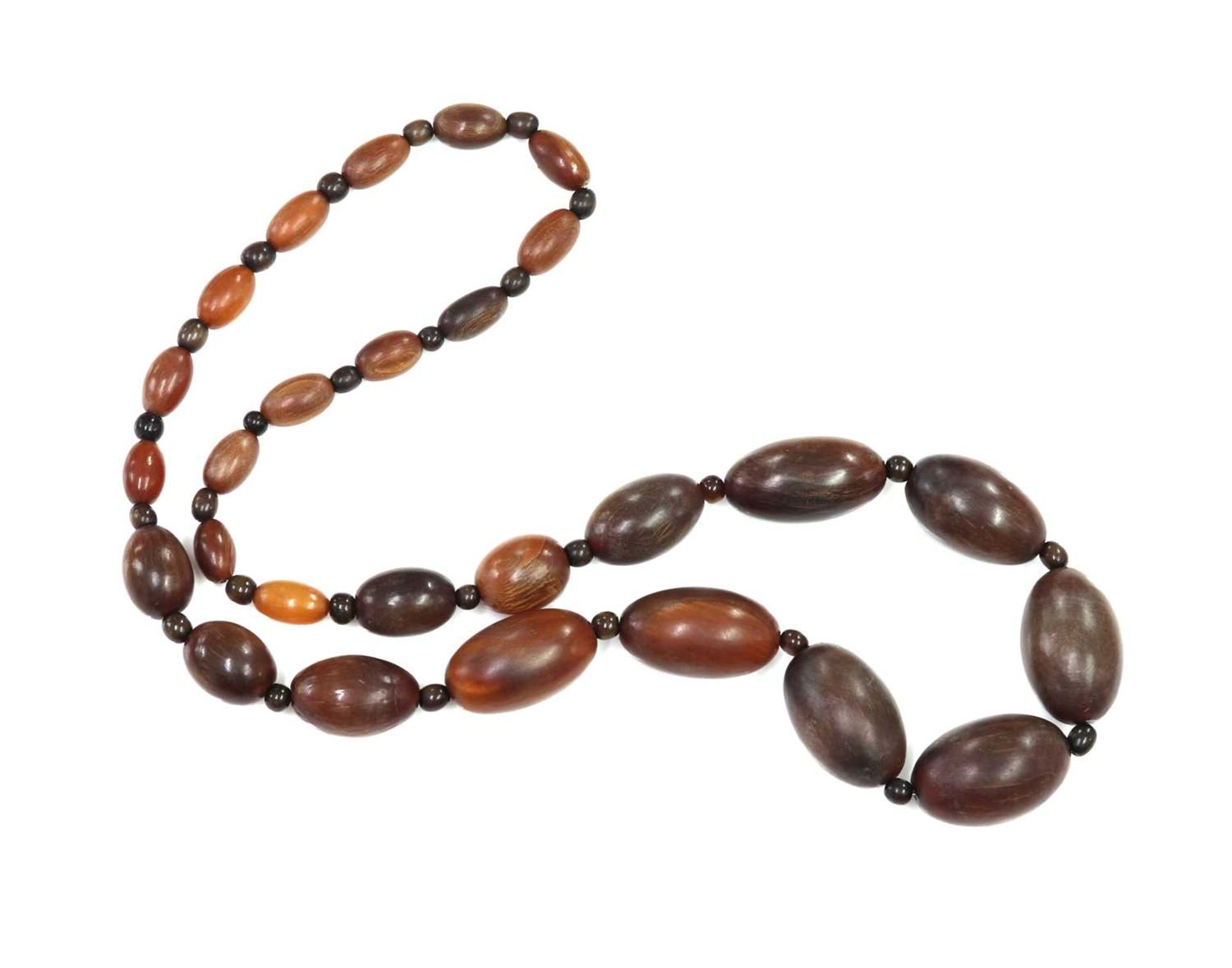 A single row graduated olive shaped buffalo horn bead necklace,