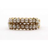 A 19th century gold two row split pearl ring,