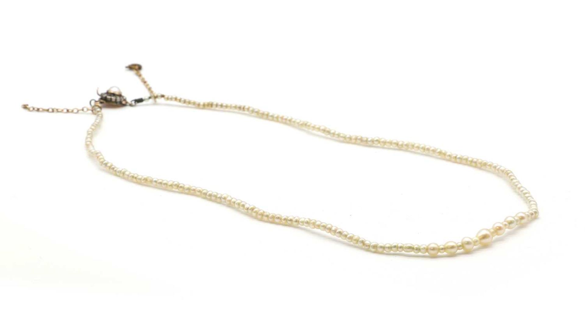 A single row graduated seed pearl necklace,