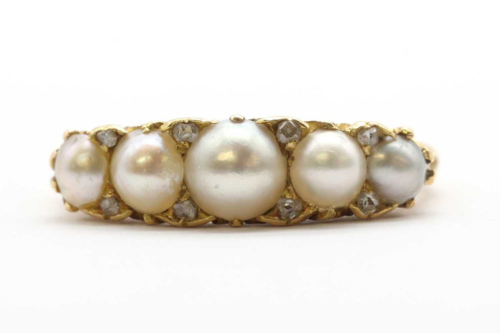 An Edwardian 18ct gold split pearl and diamond ring,