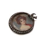 A silver mounted portrait miniature brooch,
