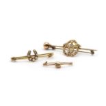 Three gold brooches,