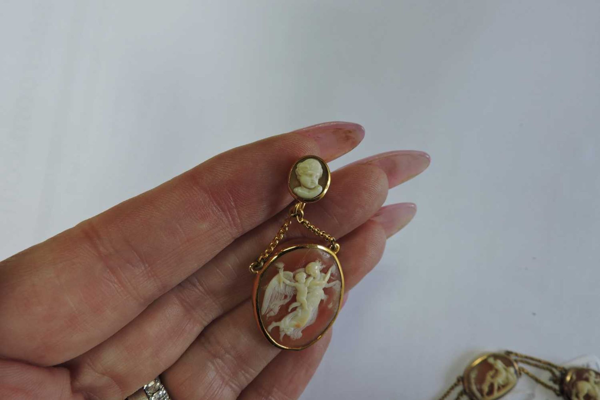 An early 19th century carved shell cameo necklace and earrings suite, - Image 6 of 20