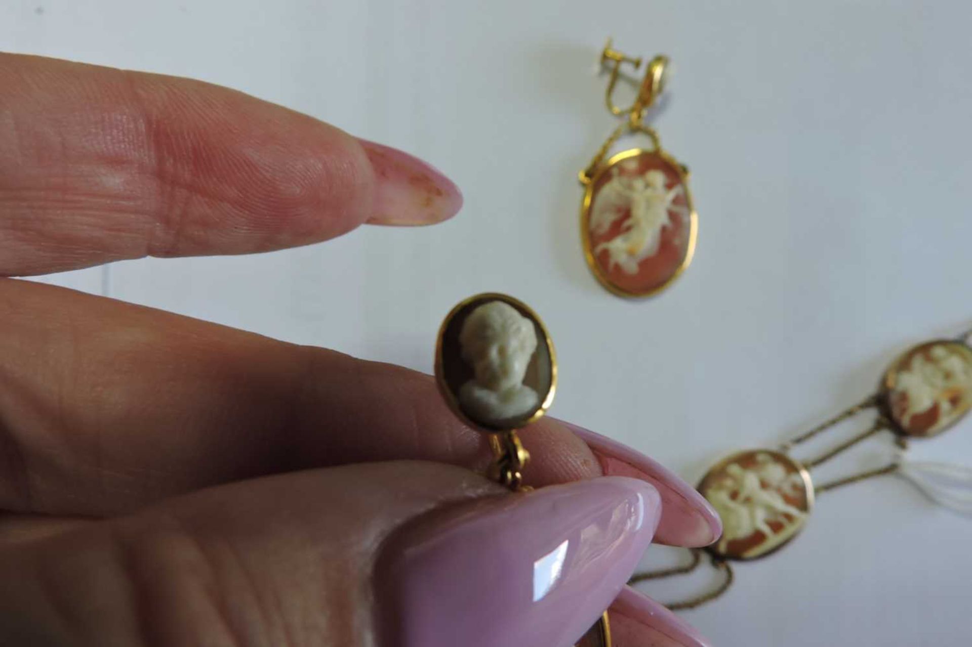 An early 19th century carved shell cameo necklace and earrings suite, - Image 12 of 20