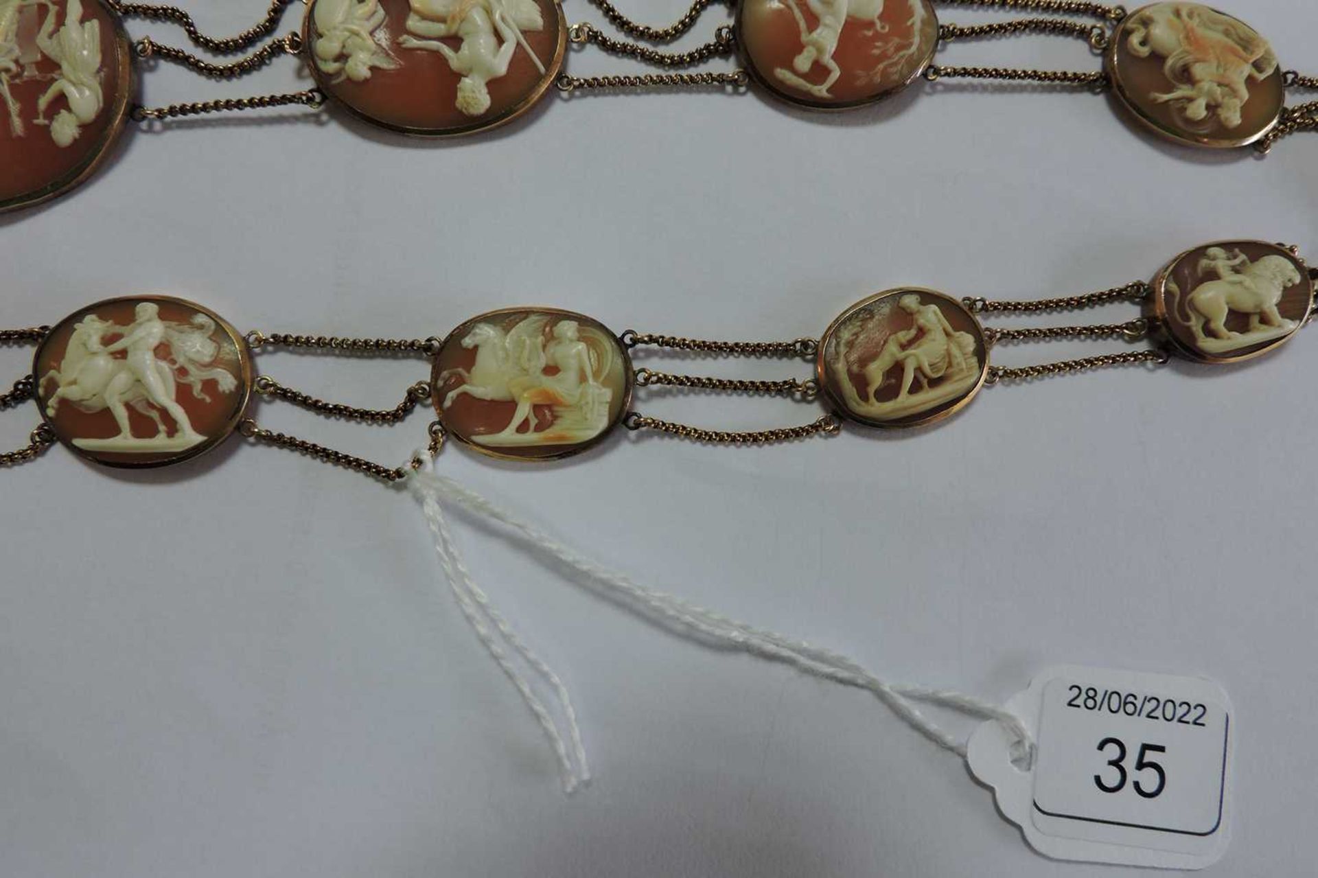 An early 19th century carved shell cameo necklace and earrings suite, - Image 17 of 20