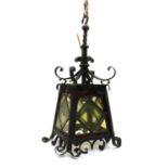 A gothic revival style wrought iron and leaded glass fan lantern,