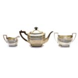 A late Victorian three piece silver tea service