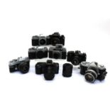 A quantity of camera bodies and lenses,