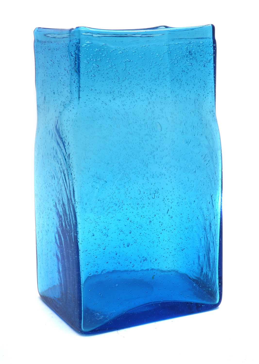 A large blue glass vase