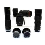 A collection of camera lenses and lens accessories,