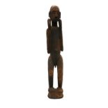 A carved Dogon figure,