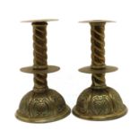 A pair of Dutch brass candlesticks