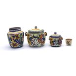 A collection of Carter Stables & Adams Poole Pottery items,