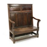 An oak settle,