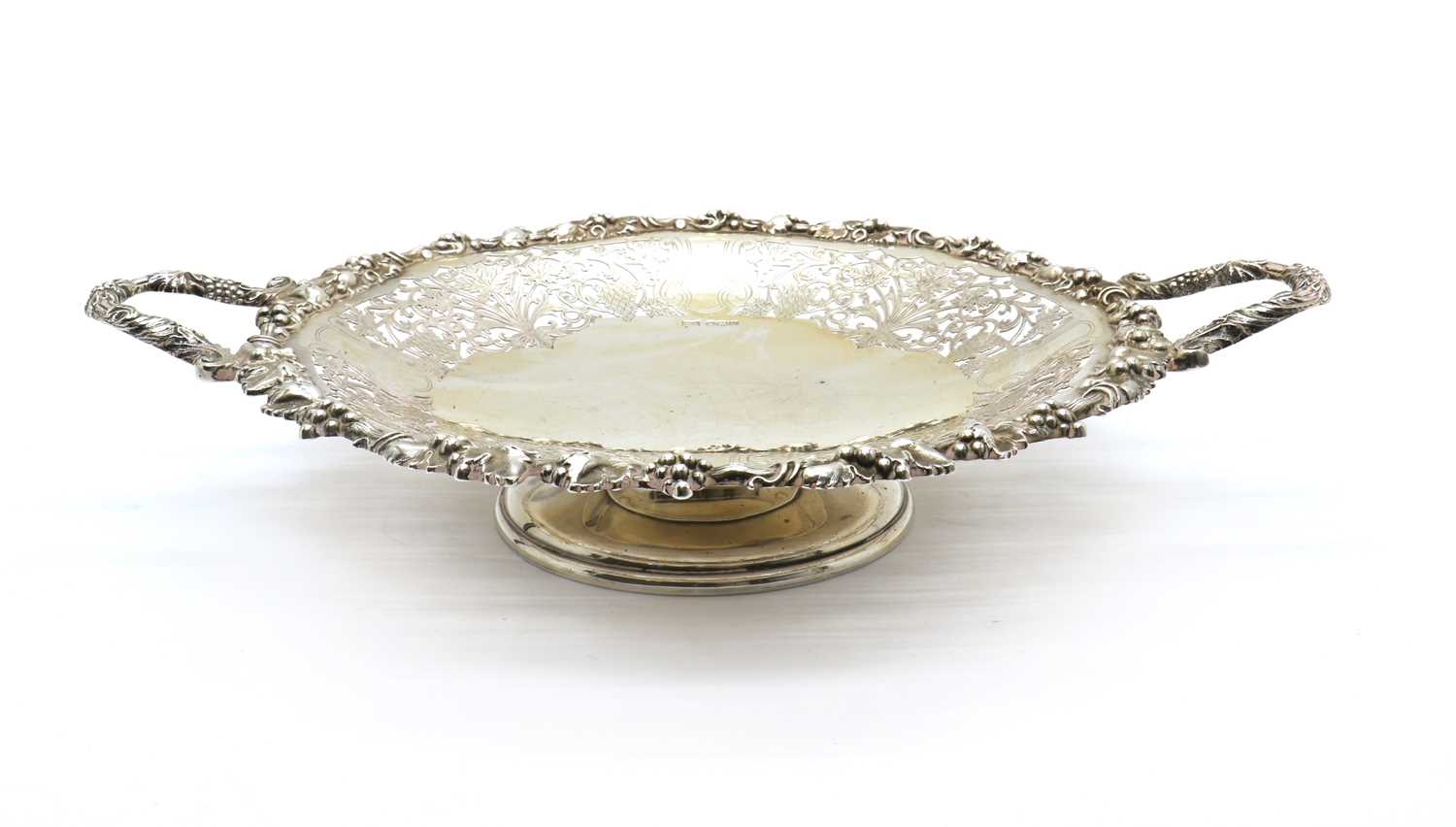 A twin handled silver pedestal dish,