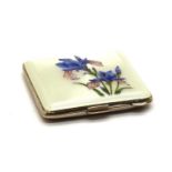 A silver and enamelled compact,