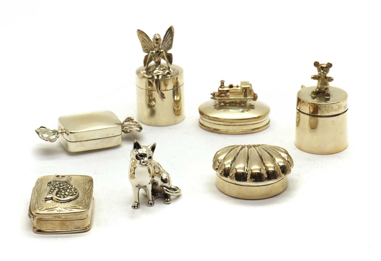 A group of six modern silver novelty pots and covers,