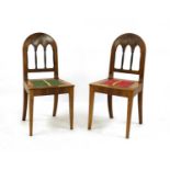 A pair of walnut hall chairs