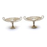 A pair of silver twin handled bon bon dishes,