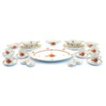 A Herend porcelain 'Chinese Bouquet Rust' pattern dinner service,