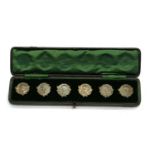 A set of six continental 'Art Nouveau' silver buttons,