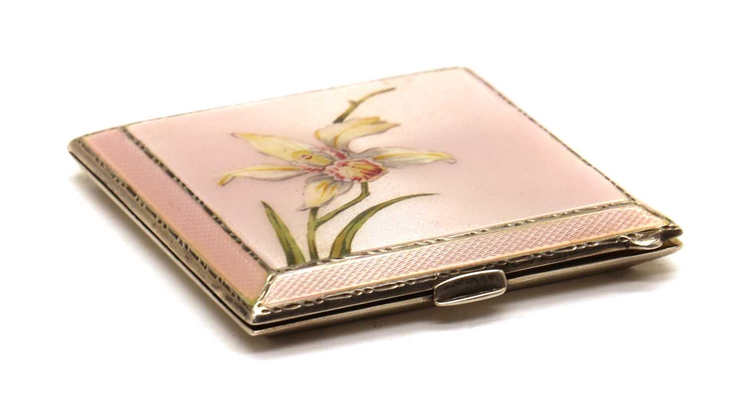 A silver and enamelled compact,