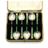 A set of six Art Nouveau silver and enamel teaspoons,