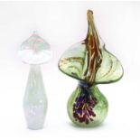 An iridescent glass jack in the pulpit vase,