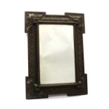 A carved mirror,
