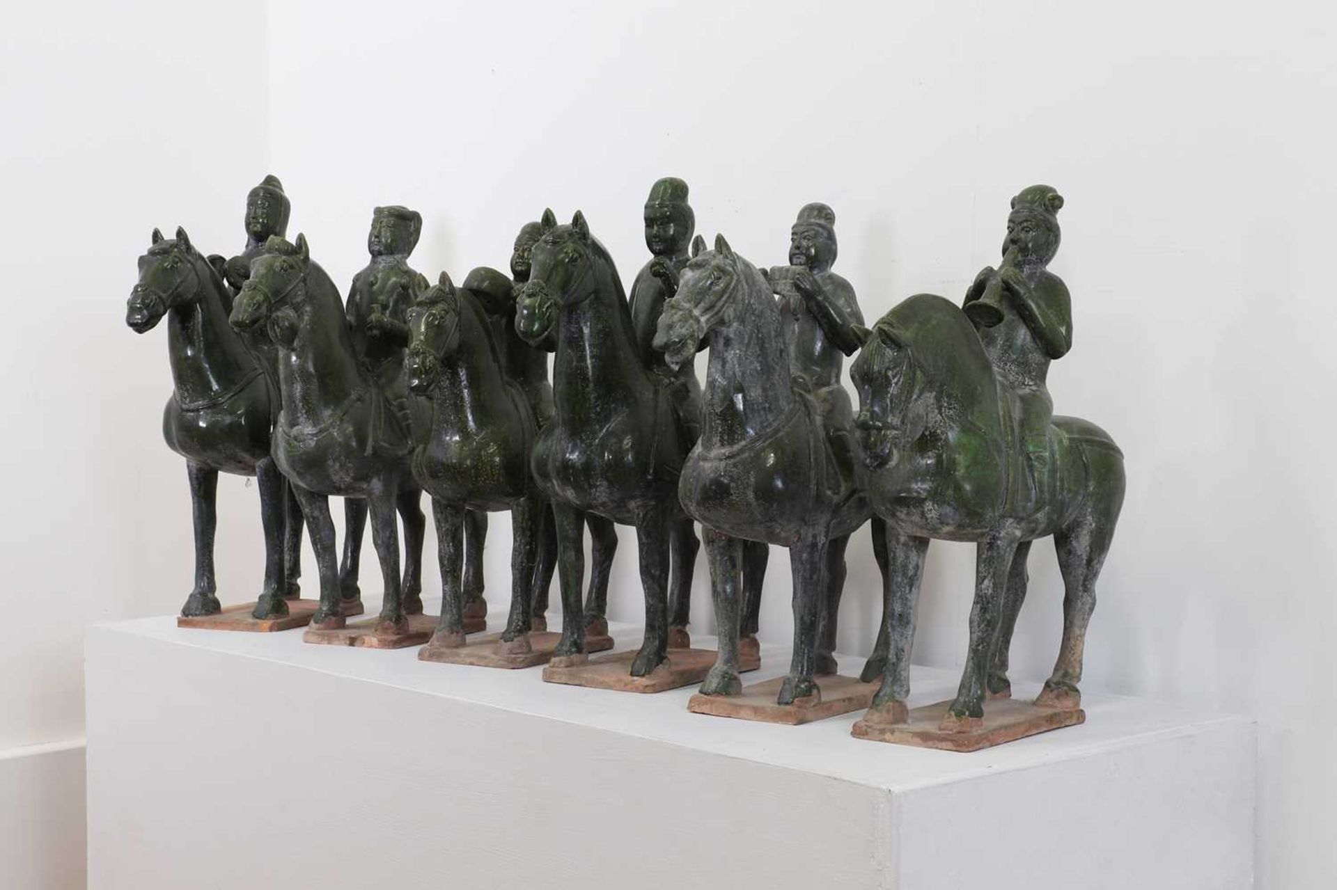A series of Tang-style terracotta musicians on horseback,