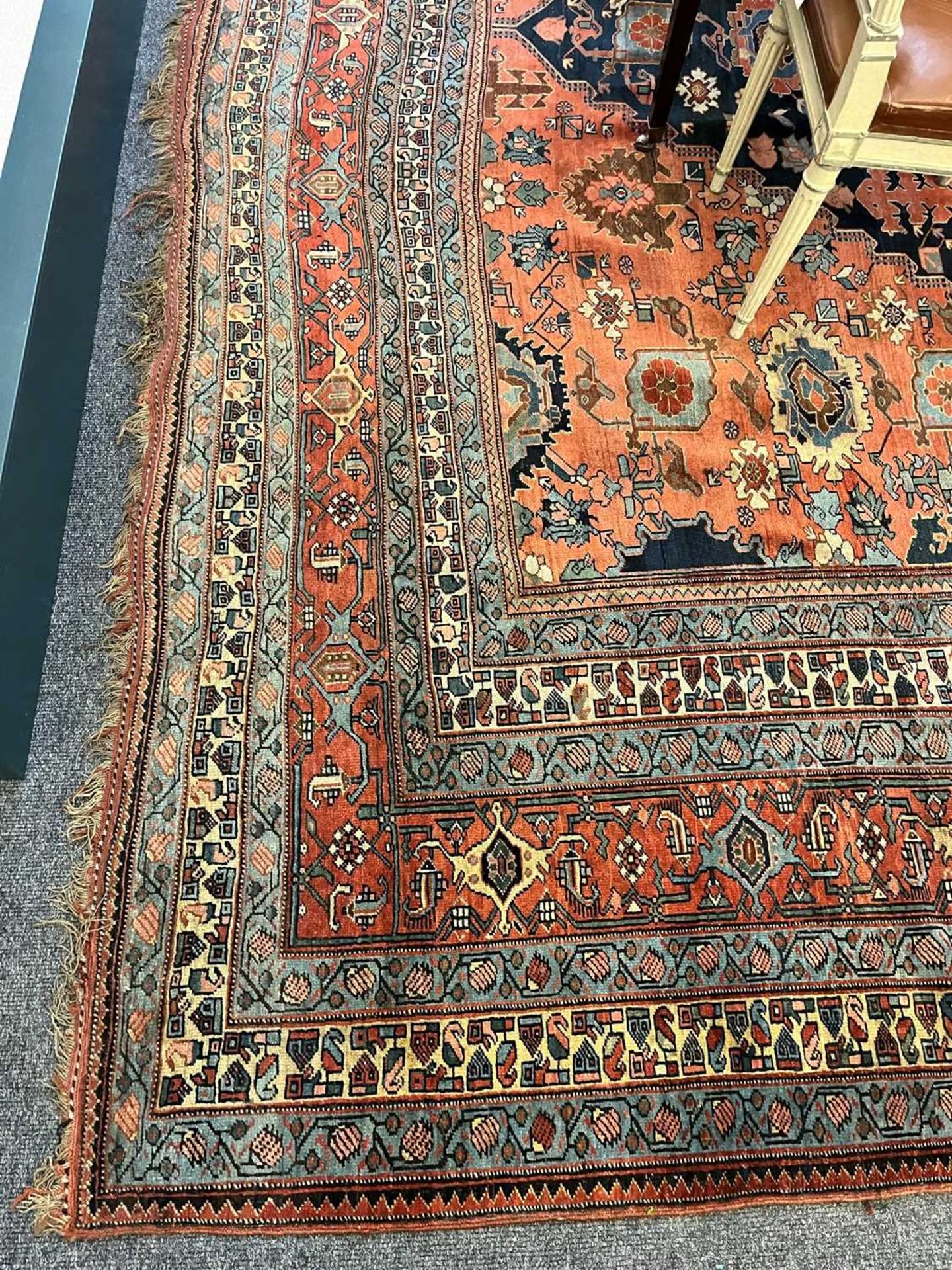 A large Persian wool carpet, - Image 3 of 28