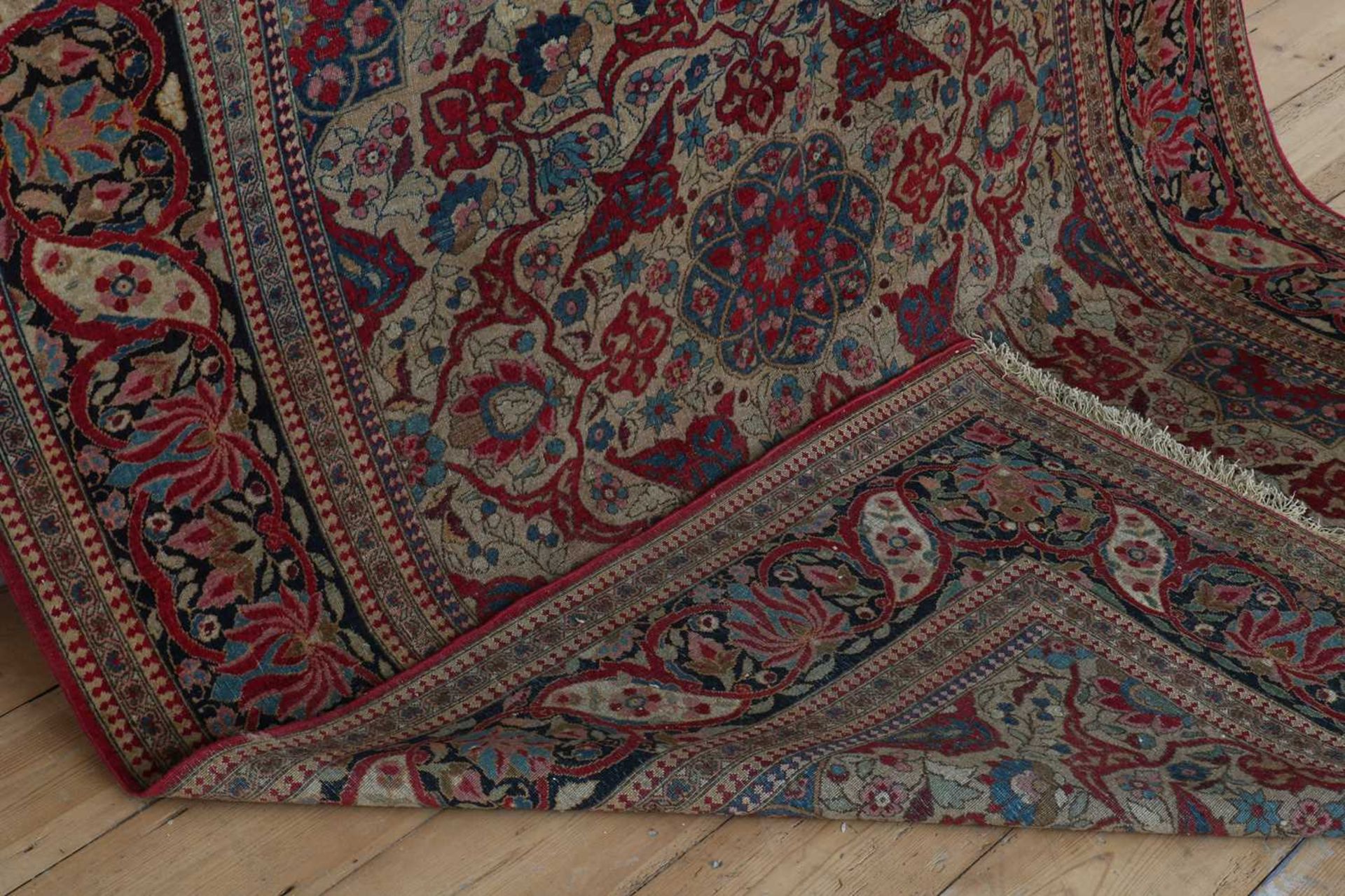 A Persian wool rug - Image 2 of 13