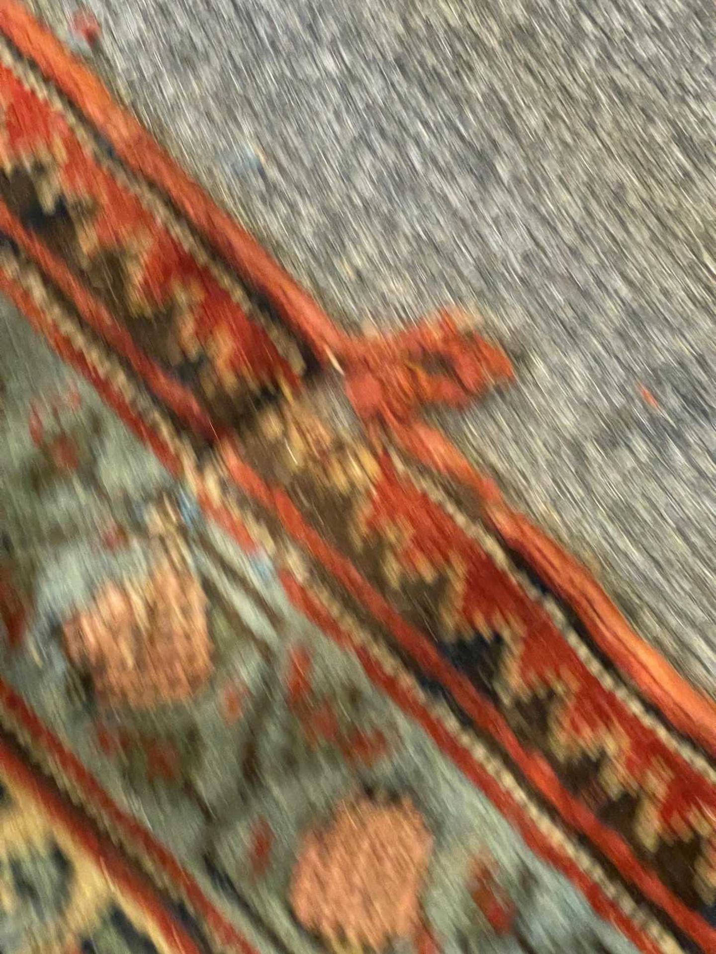 A large Persian wool carpet, - Image 14 of 28