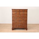 A George II walnut tall chest of drawers,