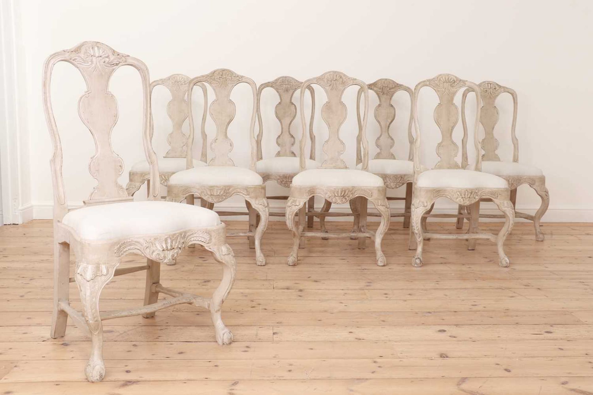 A set of eight George II-style painted oak single dining chairs,