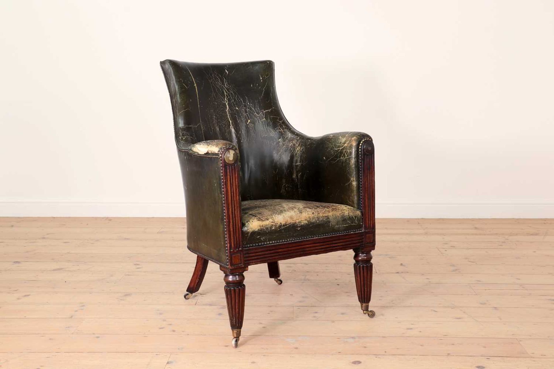 A George IV mahogany library armchair,